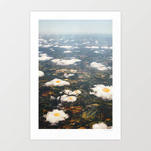 Cargar imagen en el visor de la galería, "Eggy Clouds" by Vertigo Artography - a surreal landscape art piece featuring clouds resembling fried eggs. Perfect for contemporary and whimsical art lovers. Unique nature inspired wall art with a touch of whimsy for sale.
