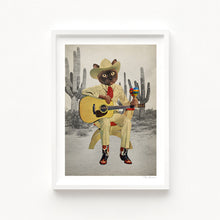 Load image into Gallery viewer, Y’all Ready for This - Cat in the Desert&quot; artwork by Vertigo Artography, featuring a cat dressed as a cowboy with a guitar and maracas, set against a desert backdrop with cacti. A whimsical and surreal piece perfect for adding a touch of humor and character to any room. Ideal for eclectic home decor and art collections.Enhance your interior with this imaginative and playful artwork. Available now for purchase, bring home this delightful fusion of fantasy and realism.