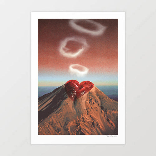 Surreal collage art print titled “Rings of Passion” featuring a volcano with red lips and smoke rings, in a dreamy romantic sky digital artwork by Vertigo Artography.